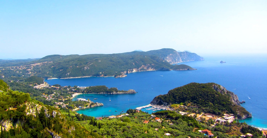 Breathtaking Panoramic View of Palaiokastritsa, Corfu - A Spectacular Coastal Landscape with Turquoise Waters and Rocky Cliffs