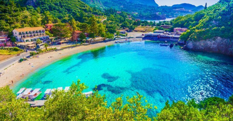 Breathtaking Panoramic View of Palaiokastritsa Beach, Corfu - A Stunning Coastal Paradise with Azure Waters and Rocky Cliffs